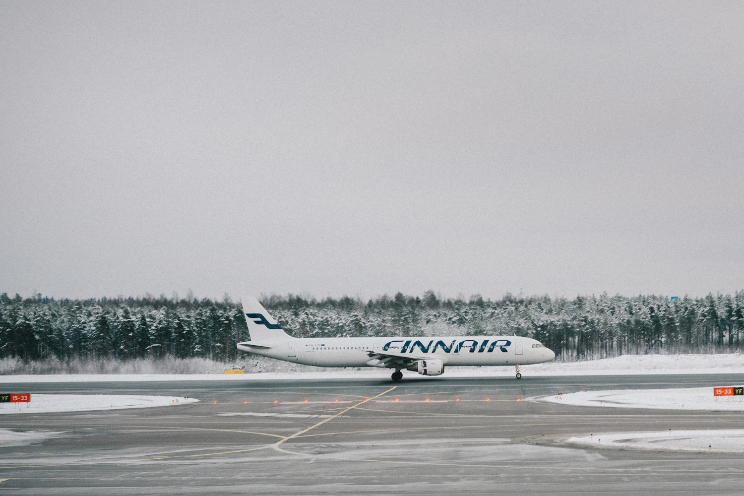 finnair aircraft on snowy tarmac