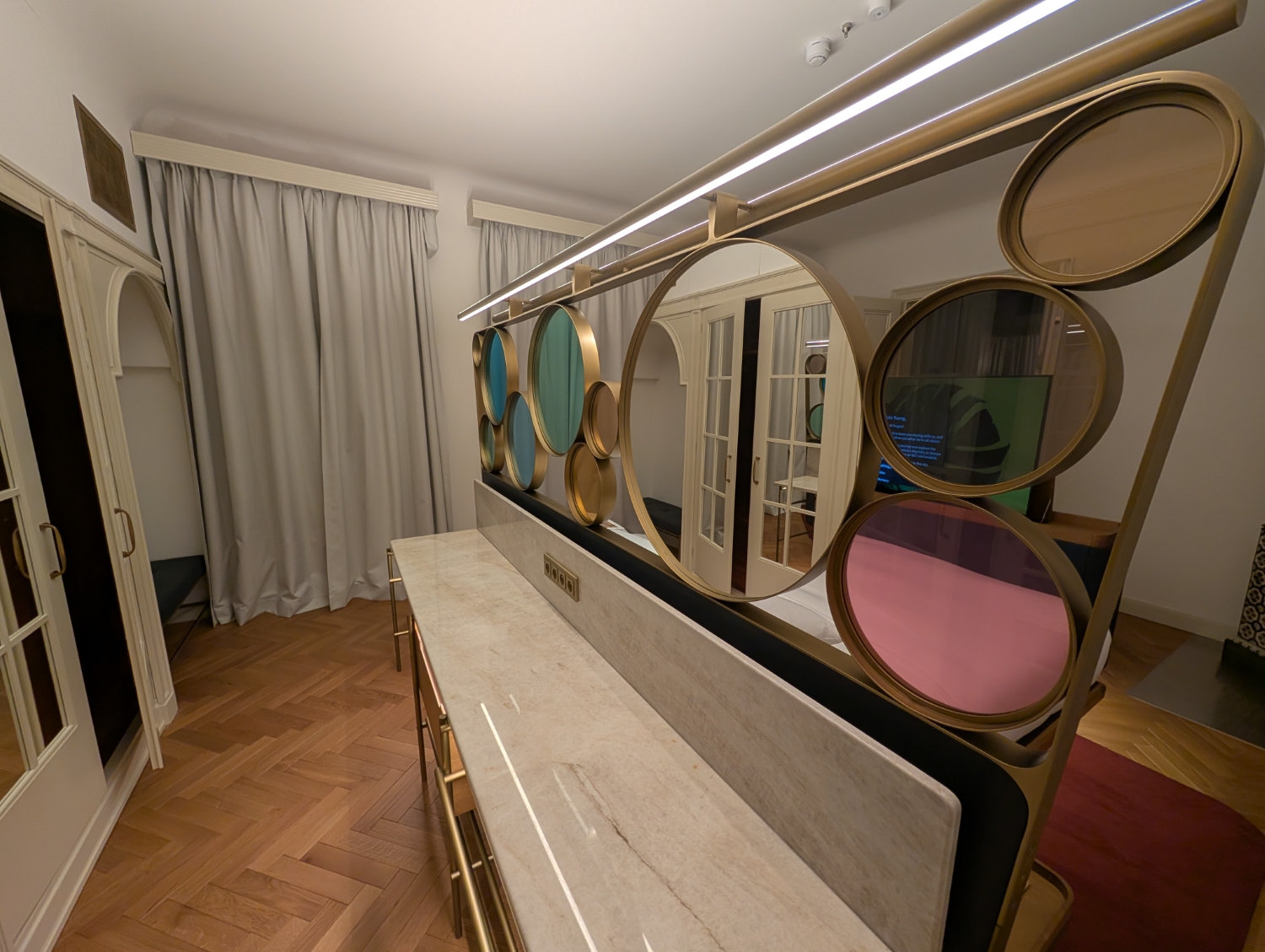 w prague hotel heritage bohemia suite vanity and storage behind bed