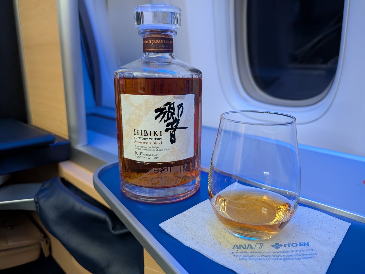 ana first class 777-300er hibiki 100 anniversary blend whisky poured with bottle