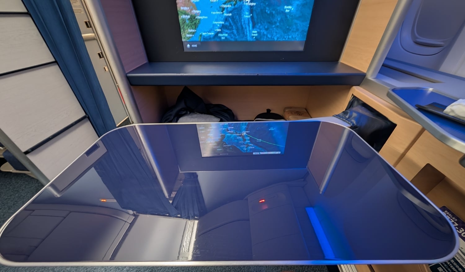 ana first class 777-300er tray table extended