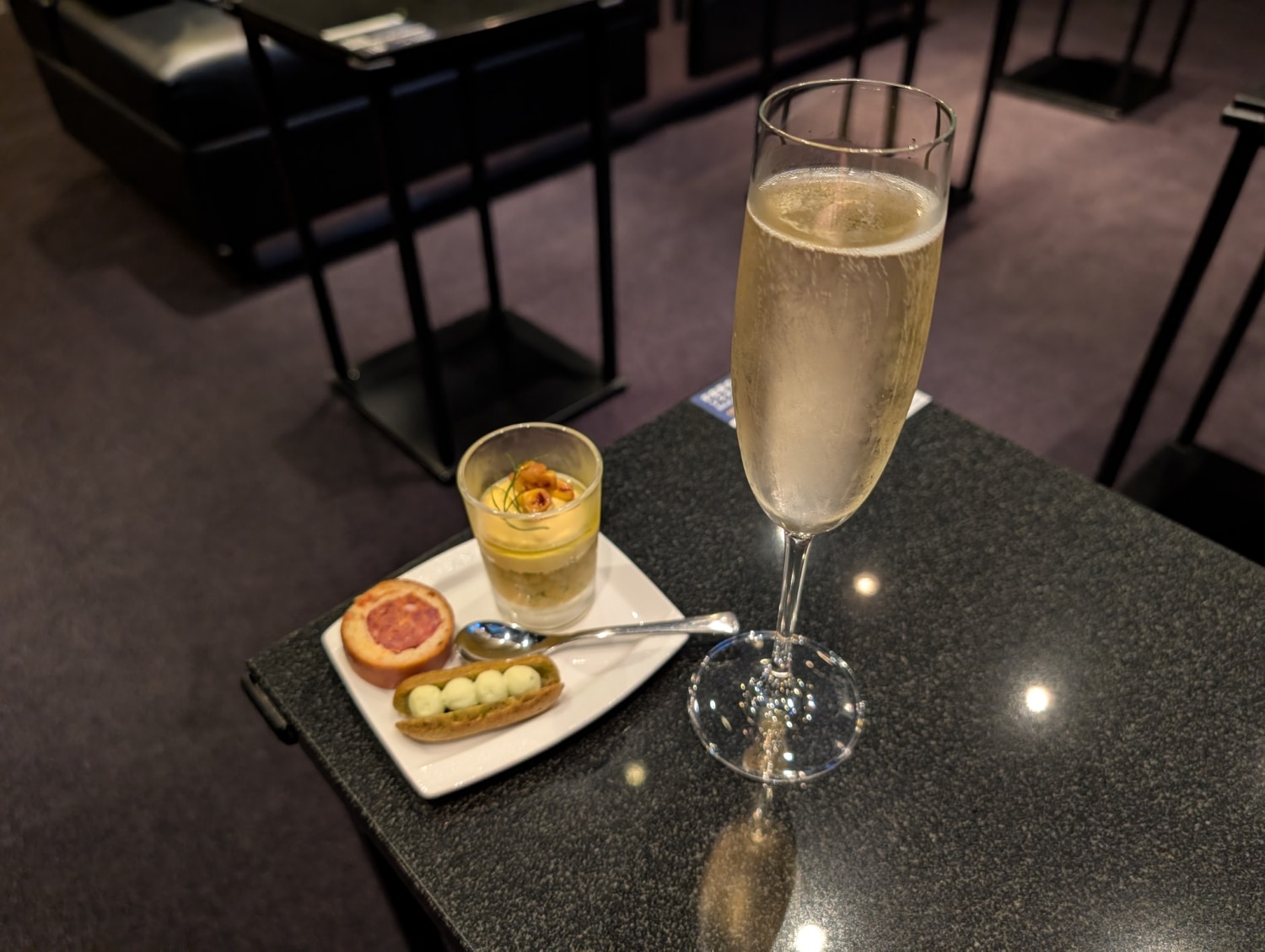 ana suite lounge tokyo haneda champagne with small bites