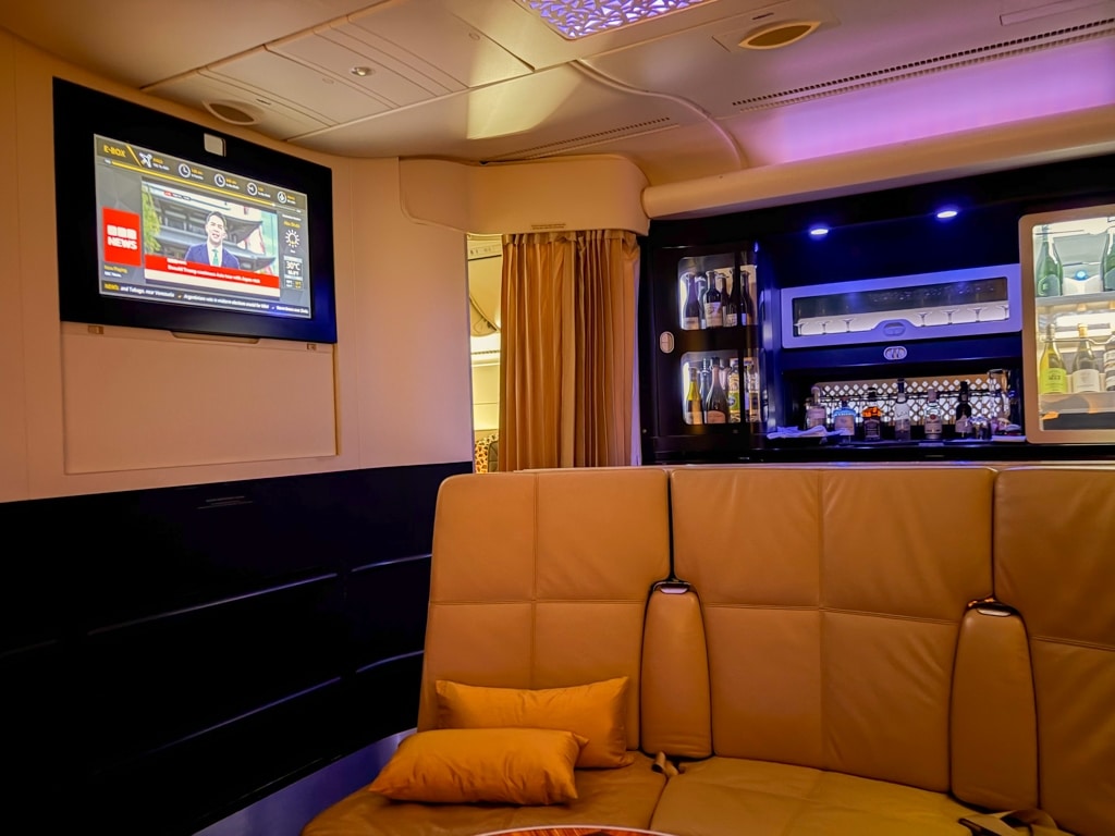 eithad airways business class a380 onboard lounge seating with television