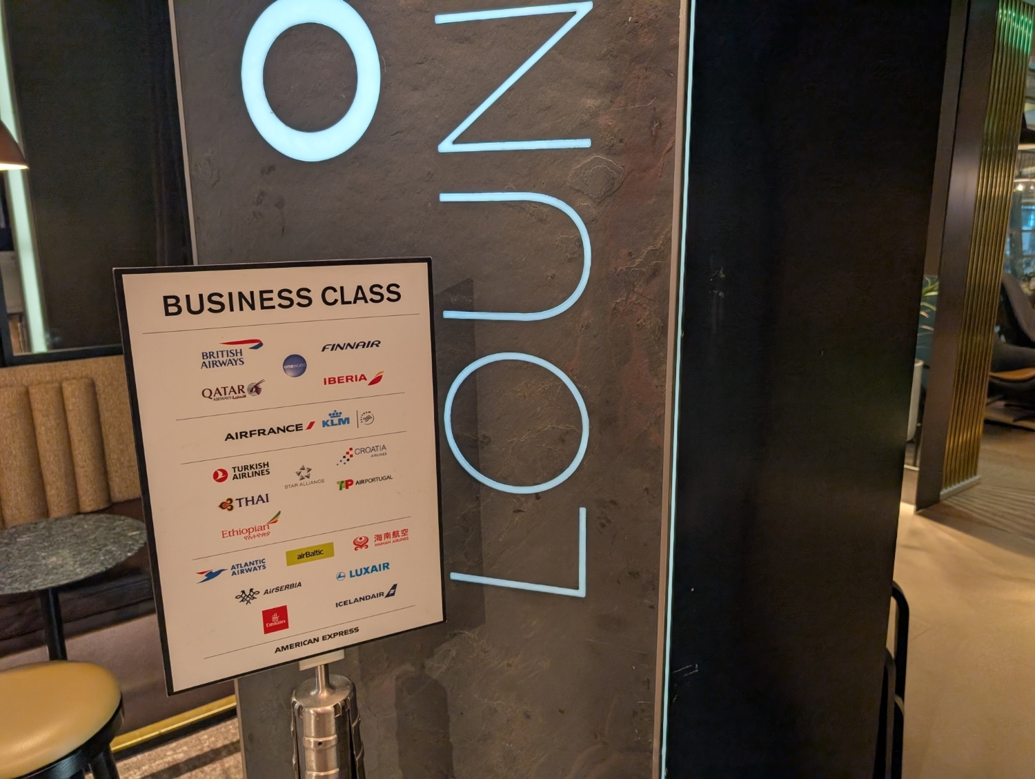 osl lounge business class section with signage