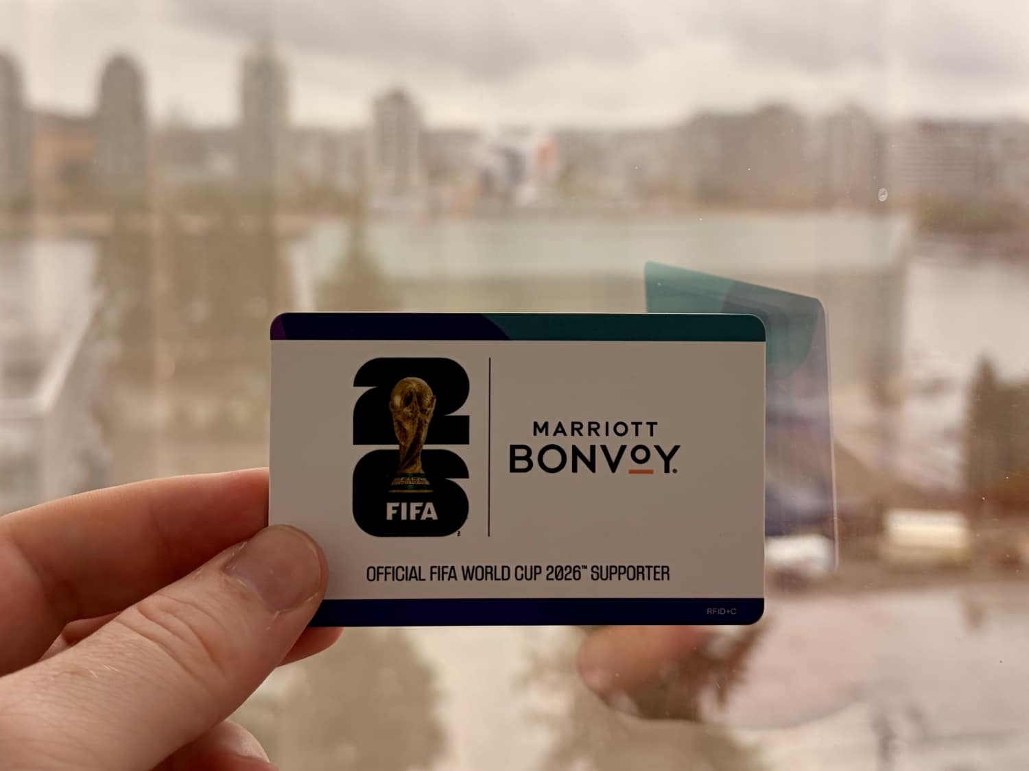 marriott bonvoy card in front of city